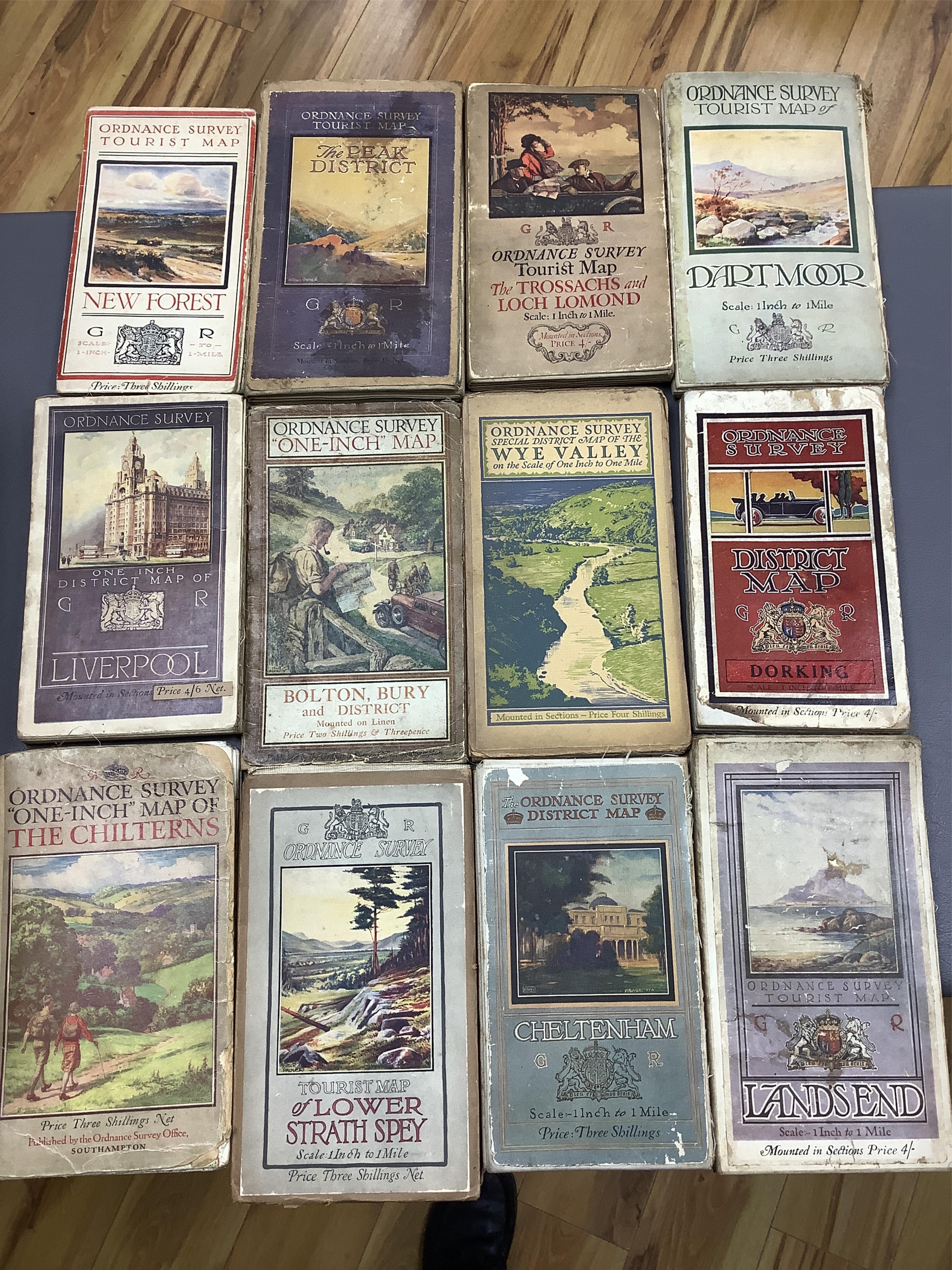 Twenty, one inch Ordnance Survey maps, together with thirty Ordnance Survey Tourist Maps, etc, 1920s/30s (50). Condition - poor to fair.